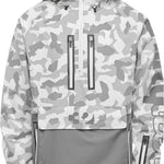 ThirtyTwo Light Shell Anorak Jacket 2025 - A light-colored jacket with a geometric pattern and zippered pockets.