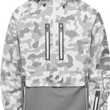 ThirtyTwo Light Shell Anorak Jacket 2025 - A light-colored jacket with a geometric pattern and zippered pockets.