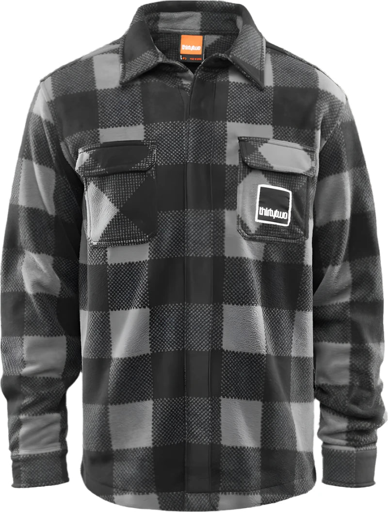 ThirtyTwo Rest Stop Fleece Shirt 2025 - A black and white plaid fleece shirt with a collar.