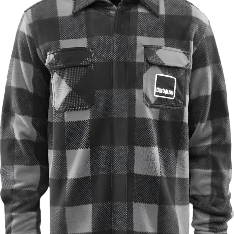 ThirtyTwo Rest Stop Fleece Shirt 2025 - A black and white plaid fleece shirt with a collar.