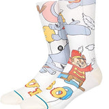 Stance Disney 100 Dumbo By Travis Millard Crew Sock 2023 - A white crew sock with a colorful illustration of Dumbo flying on it.