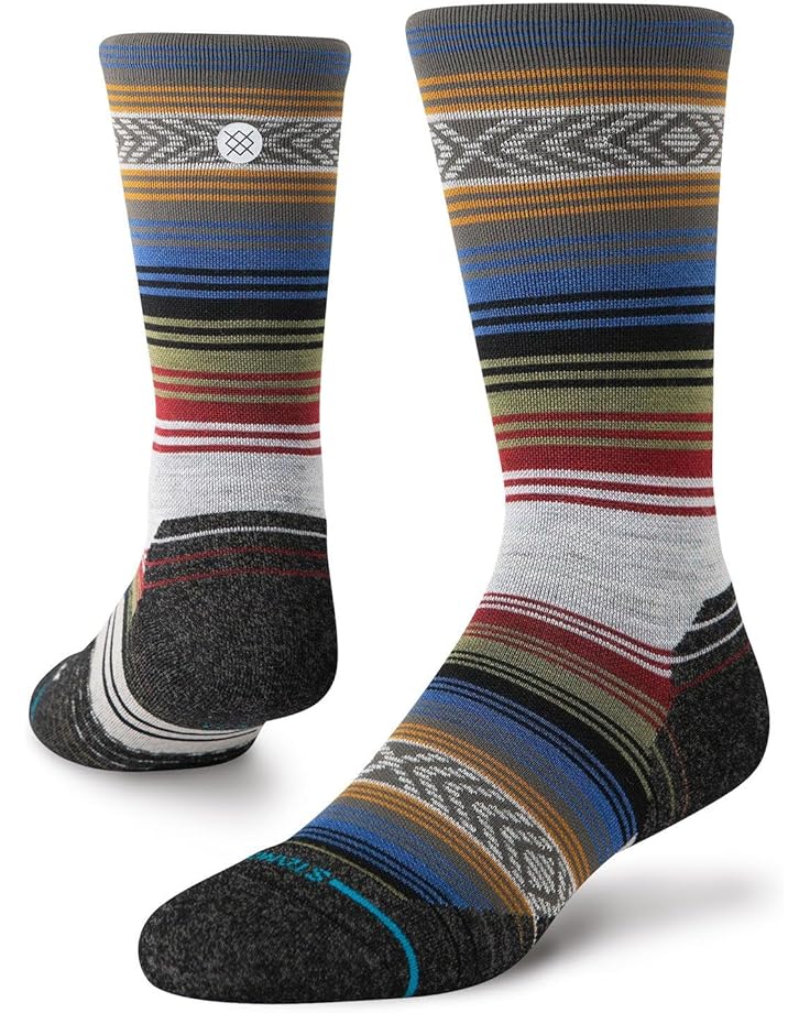 Stance Lightweight Wool Hiking Socks 2024 - A pair of hiking socks with a subtle pattern of thin stripes in various earthy tones, including brown and green.