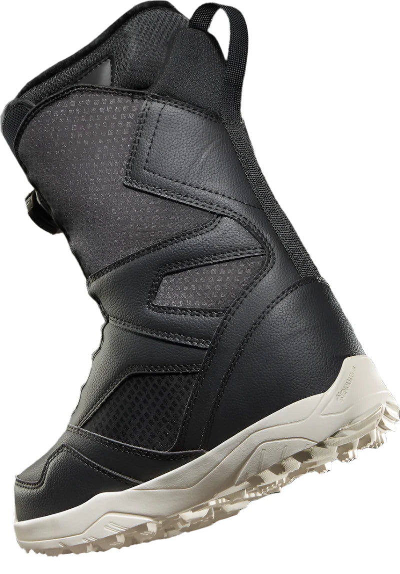 ThirtyTwo Women's STW Double BOA Snowboard Boot 2024 - Black snowboard boots with a textured pattern on the toe and heel areas.