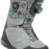ThirtyTwo Women's Lashed Double BOA Snowboard Boot 2025 - A gray and black snowboard boot with teal accents, featuring a double BOA closure system on the side.