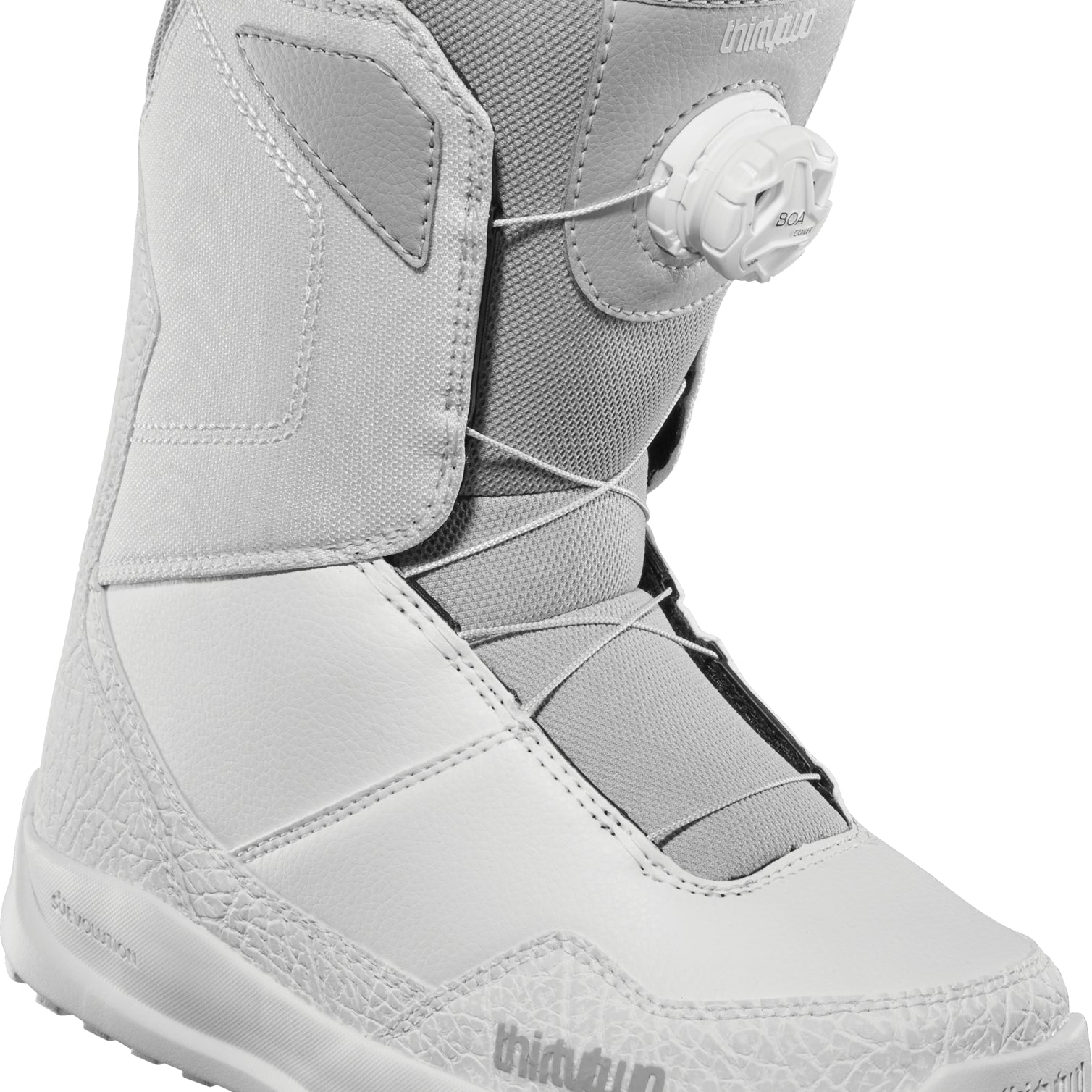 ThirtyTwo Women's Shifty BOA Snowboard Boot 2025 - A light gray snowboard boot with a textured pattern on the toe and heel, featuring a white BOA dial on the side.