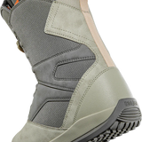 ThirtyTwo Women's STW Double Boa Snowboard Boot 2025 - A gray snowboard boot with a black strap and orange accents on the heel.