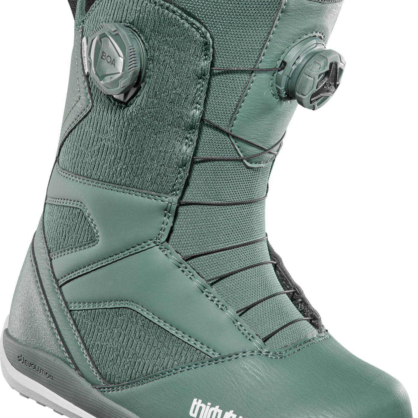 ThirtyTwo Women's STW Double Boa Snowboard Boot 2025 - A green snowboard boot with a textured pattern on the upper and white soles.