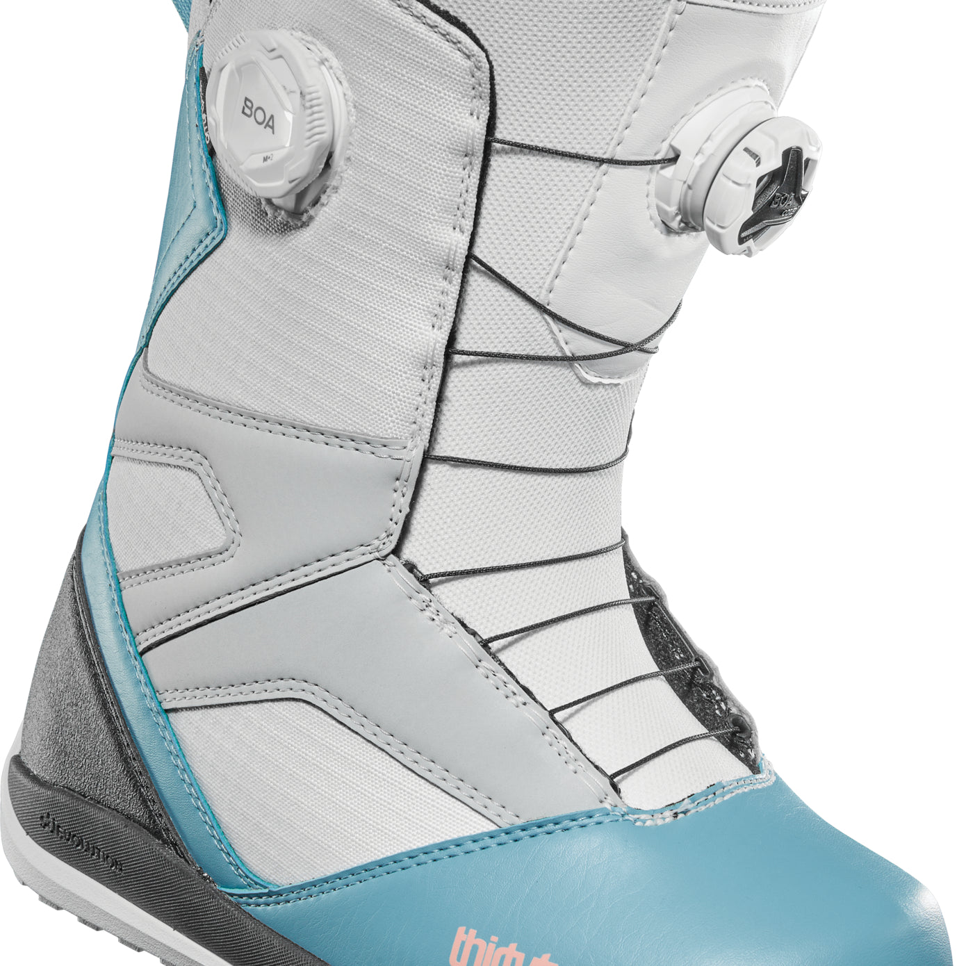 ThirtyTwo Women's STW Double Boa Snowboard Boot 2025 - A white and blue snowboard boot with a black sole, featuring two BOA dials on the side.