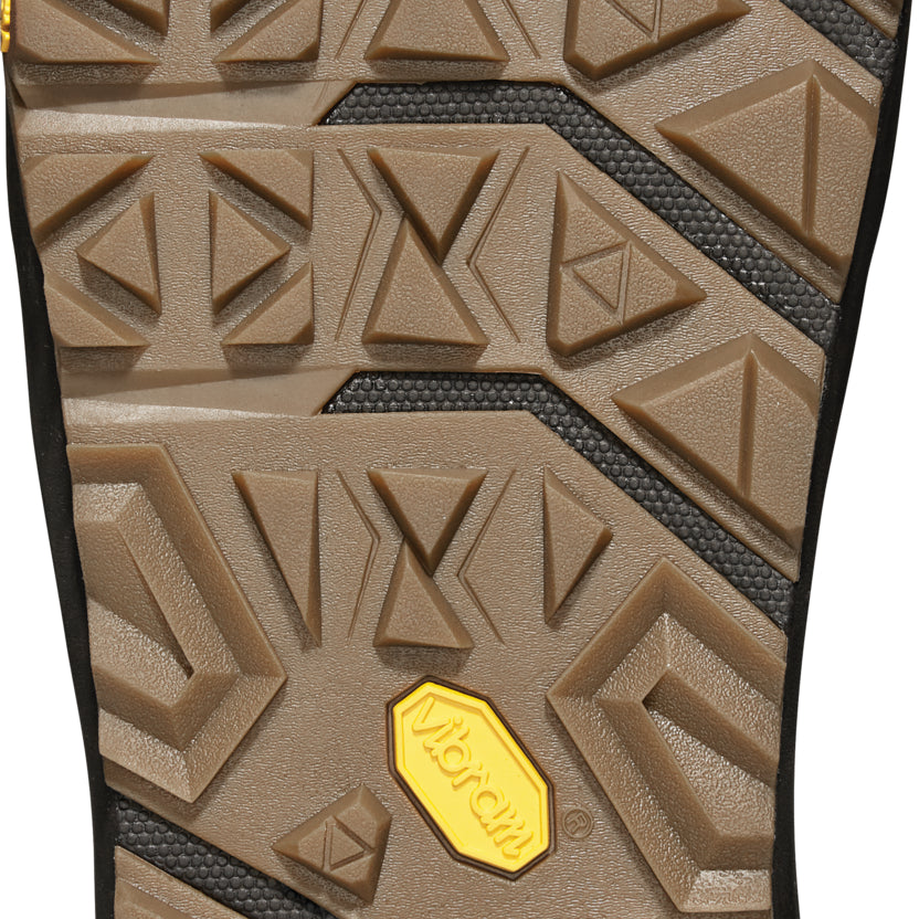 ThirtyTwo Women's TM-2 X High Snowboard Boot - Black snowboard boot with a textured, rubber outsole and a yellow logo on the heel.