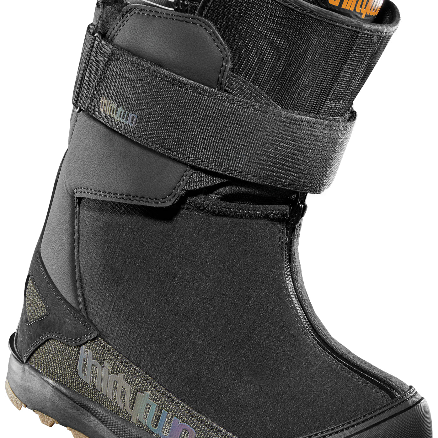 ThirtyTwo Women's TM-2 X Hight Snowboard Boot 2025 - A black snowboard boot with a strap and buckle closure, featuring a textured pattern on the side.