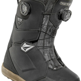 ThirtyTwo Women's Lashed Double BOA X Volcom Snowboard Boot 2025 - Black snowboard boot with a white logo on the side and a black strap with silver hardware.