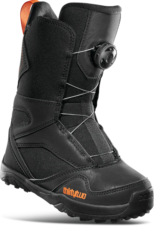 ThirtyTwo Junior's BOA Snowboard Boot 2025 - Black snowboard boot with orange accents and a black BOA dial on the side.