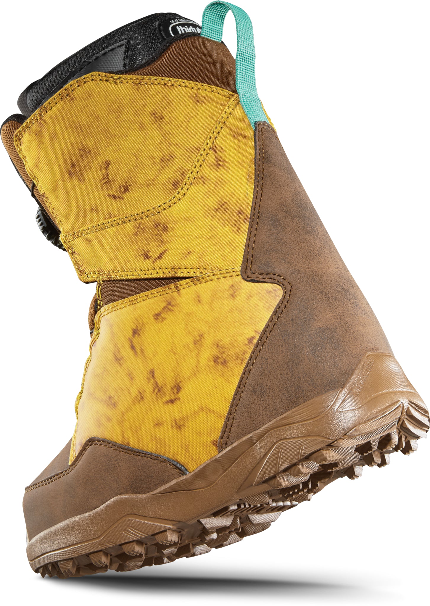 ThirtyTwo Junior's Lashed BOA X Fava Snowboard Boot 2025 - A brown snowboard boot with a black strap and white logo on top, featuring a marbled yellow pattern on the side.