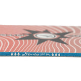 Nitro Alternator X Volcom Snowboard 2025 - A pink snowboard with a black starburst design on top of white wavy lines.