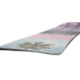 Nitro Cheap Thrills Snowboard 2025 - A snowboard with a light blue background and palm tree graphic on the bottom left corner.