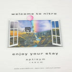 Nitro Women's Optisym Snowboard 2025 - A snowboard with a white base and black binding mounts.