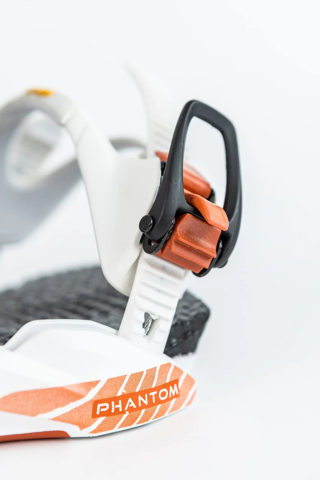 Nitro Phantom Snowboard Bindings 2025 - A pair of white snowboard bindings with orange accents and a black strap.