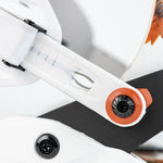 Nitro Phantom Snowboard Bindings 2025 - A pair of white snowboard bindings with silver screws and black straps.