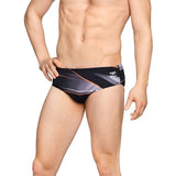 Speedo Infinite Pulse Brief Swimsuit - A black swimsuit with a geometric pattern of orange and gray lines.