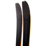 Dynafit - Tigard 107 Flat Ski 2025 with a black base and orange accents on the edges.