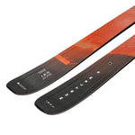 Blizzard Rustler 9 Skis 2025 - A pair of skis with a dark brown base and orange accents on the top sheet, featuring a distinctive pattern of diagonal lines in lighter shades of brown.