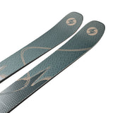 Blizzard Anomaly 94 Skis 2025 - A pair of skis with a dark gray base and light gray accents, featuring a distinctive pattern on the top sheet.