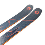 Blizzard Anomaly 88 Skis 2025 - A pair of skis with a black base and orange accents, featuring a textured pattern on the top surface.