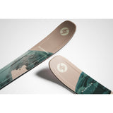 Blizzard Rustler 9 Skis 2026 - A pair of skis with a tan top and teal-green patterned bottom, featuring a white logo on the tip.
