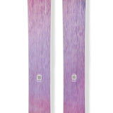 Purple and pink downhill skis with circular logo decals on the top surface.