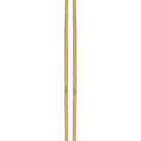 Cream skis with black tips and slim profile, shown from the side.