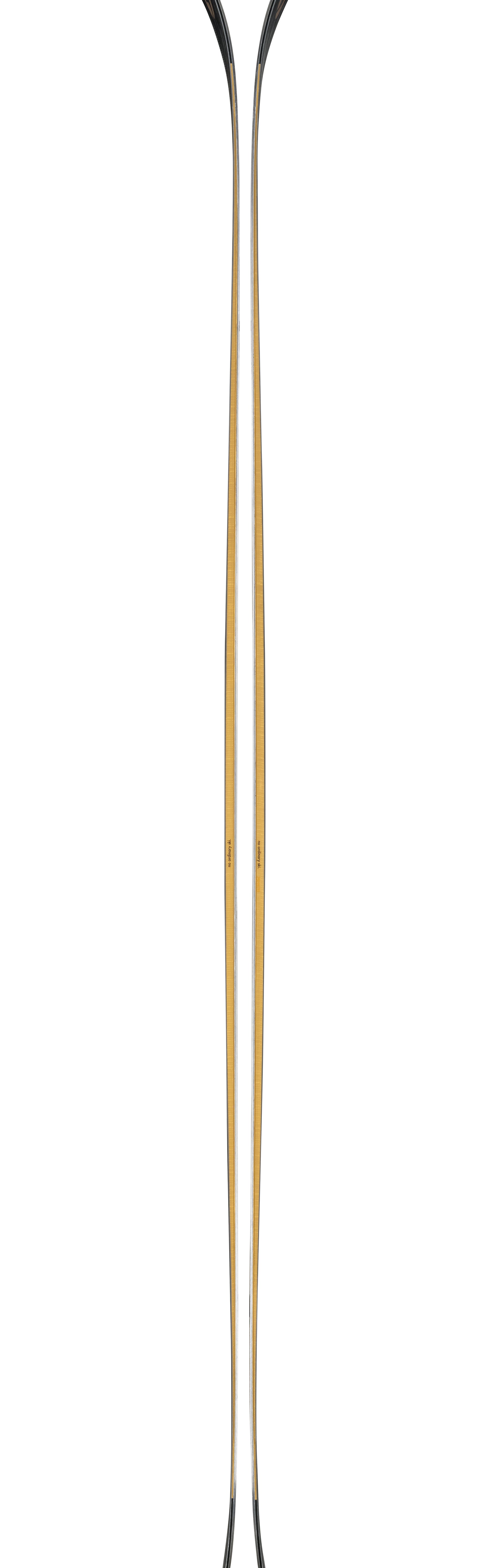 Cream skis with black tips and slim profile, shown from the side.