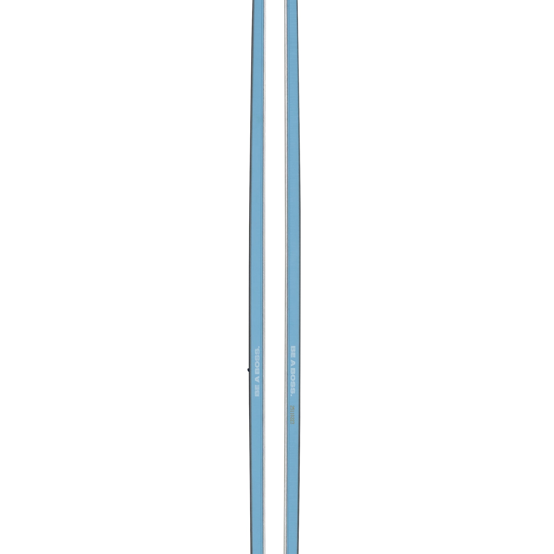 Pair of light blue skis with black tips and slim side profile