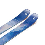 Two blue skis shown in angled view, textured sky graphic on topsheets