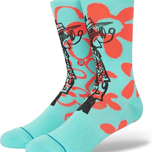 SURF CHECK BY RUSS C SOCK 2023 - A pair of light blue crew socks with a red and black graphic design featuring a man surfing on the front.
