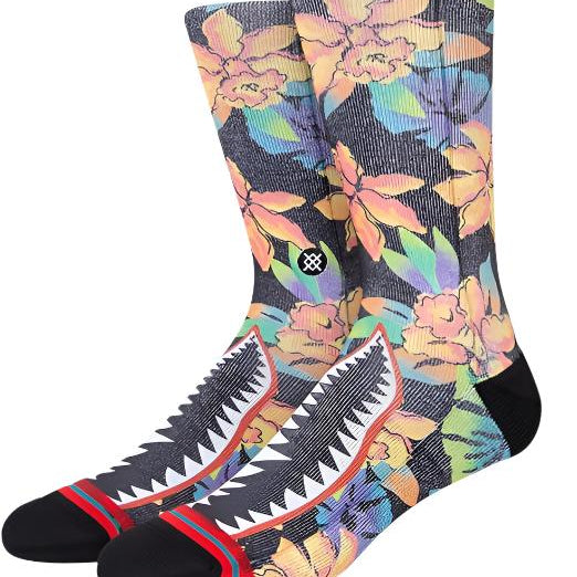 Stance Bomin Crew Sock 2024 - A pair of crew socks with a black background and colorful floral pattern featuring pink, yellow, blue, green, and purple flowers.