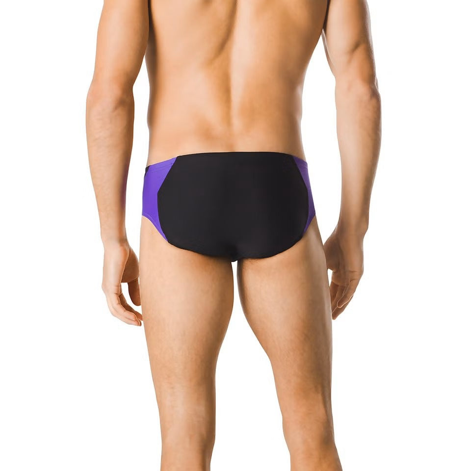 Speedo Spark Splice Brief Swimsuit - A purple, black, and white swimsuit with a geometric pattern on the front.