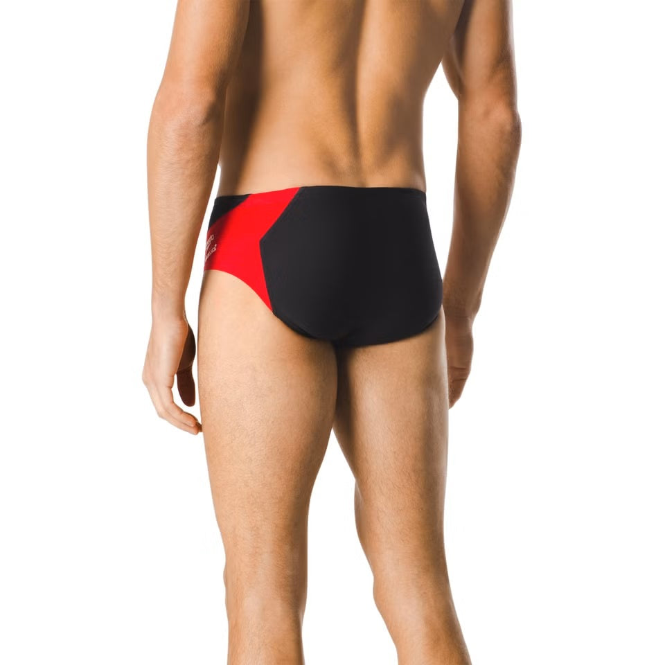 Speedo Spark Splice Brief Swimsuit - A red, black, and white swimsuit with a geometric pattern on the front.