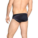 Speedo Infinite Pulse Brief Swimsuit - A navy blue swimsuit with a white and light blue wave pattern on the front, featuring a high waist and low leg cut.