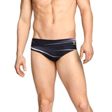 Speedo Infinite Pulse Brief Swimsuit - A black swimsuit with a white geometric pattern and a small yellow logo on the left hip.