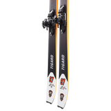 Dynafit Tigard 97 Flat Skis - 2025 model with a sleek black and orange color scheme, featuring a distinctive white stripe along the top edge of each ski.