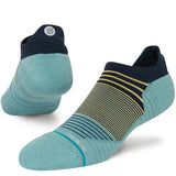 Stance Flounder Tab Ankle Sock 2023 - A light blue ankle sock with a darker blue tab at the top and yellow stripes on the arch.