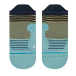 Stance Flounder Tab Ankle Sock 2023 - A pair of ankle socks with a light blue base and yellow stripes, featuring a flounder tab at the top.