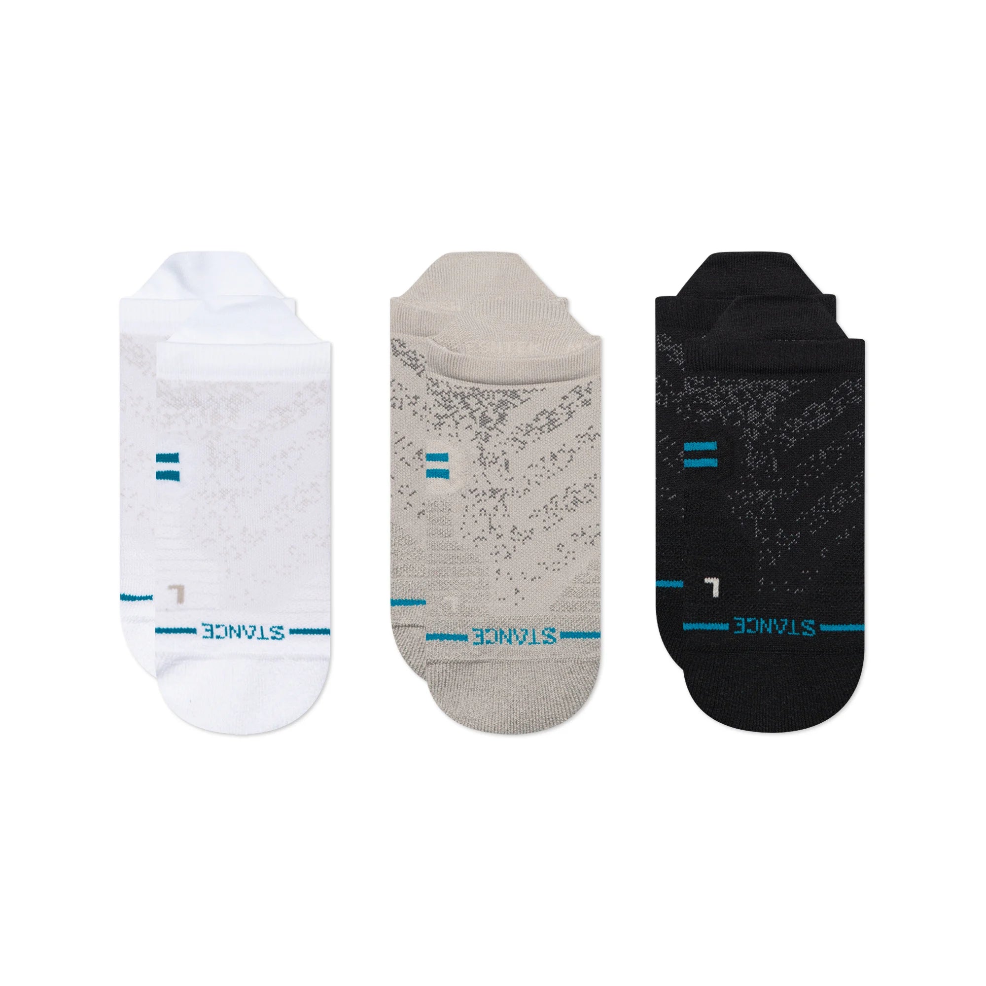 Stance Men's Athletic Tab Sock 3-Pack - Three athletic socks in a pack, featuring gray and white stripes on the top portion of each sock.