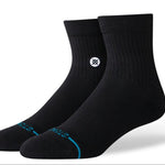Stance Icon Quarter Sock 2025 - Black socks with a white logo on the ankle area.