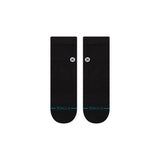 Stance Icon Quarter Sock 2025 - A pair of black ankle socks with a white logo on the top.