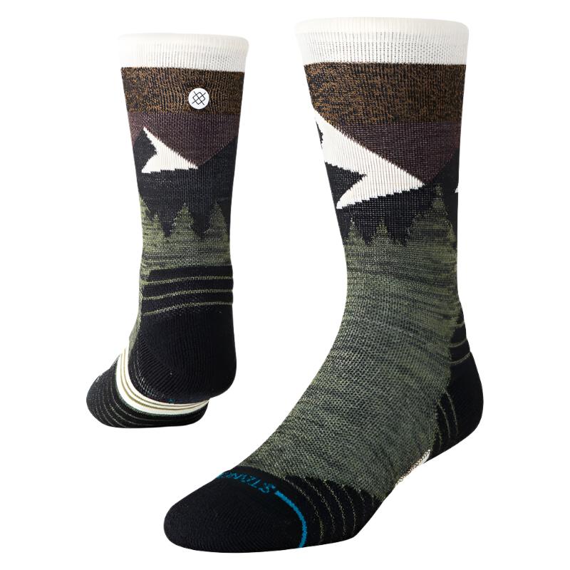 Stance Midweight Wool Hiking Sock 2024 - A pair of hiking socks with a brown and green color scheme, featuring a geometric pattern on the top portion.
