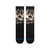 Stance X Queen Golden Crew Socks 2024 - A pair of black crew socks with a gold crown and "Queen" logo on the top, featuring a teal stripe at the bottom.