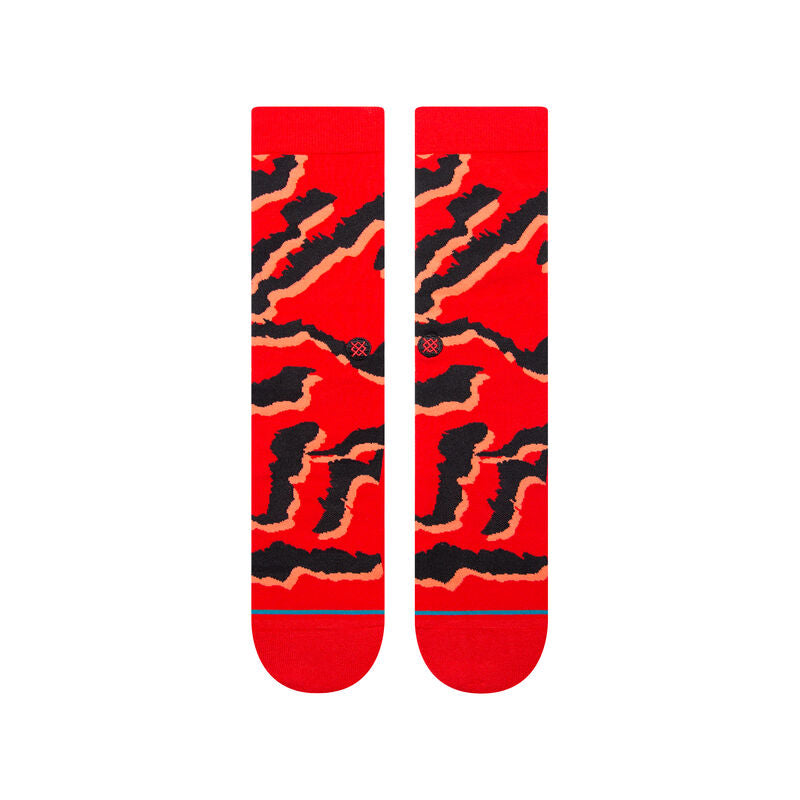 PELTER CREW SOCK 2024 - Red crew socks with black abstract pattern and small red logo on top.