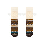 Stance Have Some Eggnog Crew Sock 2025 - Brown crew socks with a festive Christmas design featuring snowflakes, trees, and eggnog mugs.
