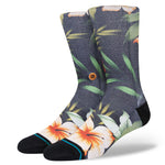 Stance Cabana Poly Crew Socks 2023 - A pair of navy crew socks with a tropical floral pattern and orange accents.